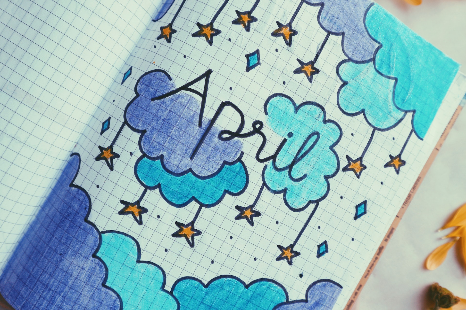 A notebook with the word April written on it